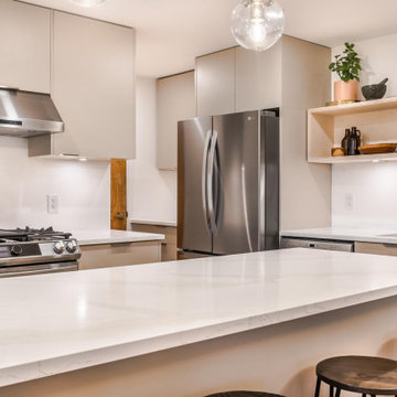 Tidal Sand Flat door kitchen cabinets with quartz countertops