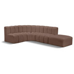 Meridian Furniture - Arc Vegan Leather Upholstered 5-Pc. L-Shaped Modular Sectional, Brown - Unleash modern opulence with the Arc Vegan Leather 5pc. Sectional. Crafted for the modern connoisseur, this Sectional injects an air of refined luxury into any space. Its sleek silhouette, upholstered in supple brown vegan leather, exudes timeless sophistication while the deep channel tufting adds textural intrigue, further elevating the chair's visual appeal. The modular design makes it a versatile chameleon, effortlessly adapting to your evolving needs and preferences. Whether you envision it gracing a chic living room corner, basking in the glow of a bedroom window, or adding a touch of drama to a home office, the Arc seamlessly complements your unique interior aesthetic.