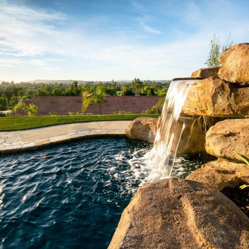 Pool with slide, water fall and fire feature!