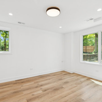 Modern Guest Bedroom with Warm Natural Tones