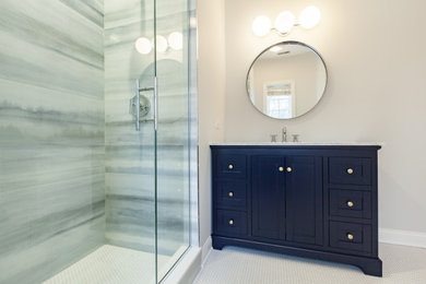 Inspiration for a large transitional kids' white tile and porcelain tile porcelain tile, white floor and single-sink alcove shower remodel in Chicago with furniture-like cabinets, blue cabinets, an undermount sink, marble countertops, a hinged shower door, gray countertops and a freestanding vanity