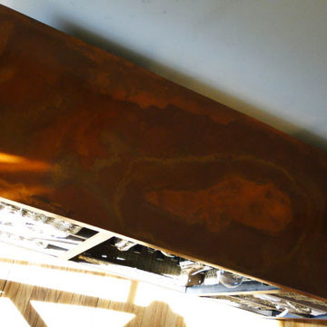 steel buffet table with patina and walnut shelves