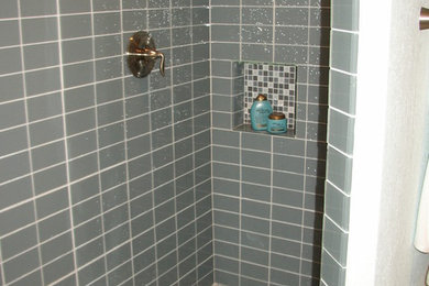 Example of a minimalist gray tile bathroom design in Other