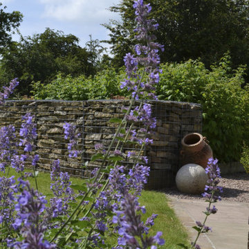 Stone/ brick etc landscape elements.