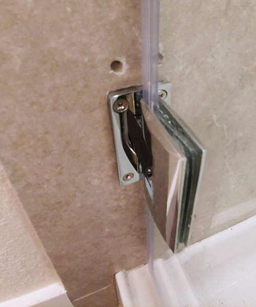 Hole covers for shower tile (in polished chrome)