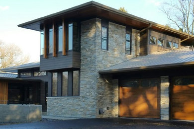 Transitional exterior home idea in Milwaukee