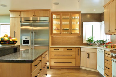 Inspiration for a large contemporary u-shaped porcelain tile eat-in kitchen remodel in Los Angeles with an undermount sink, flat-panel cabinets, light wood cabinets, quartz countertops, brown backsplash, porcelain backsplash, stainless steel appliances and an island