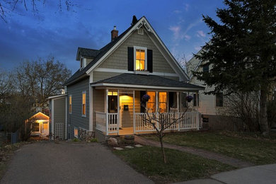 Transitional front porch photo in Minneapolis