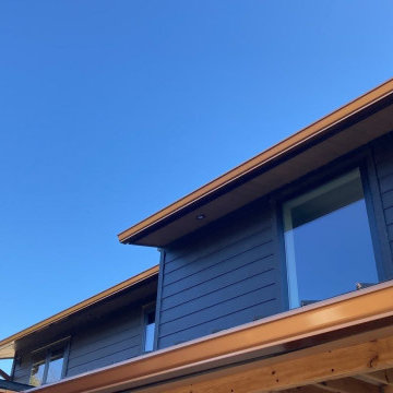 Modern Exterior Transformation with Metal Roofing & James Hardie Siding in Highl