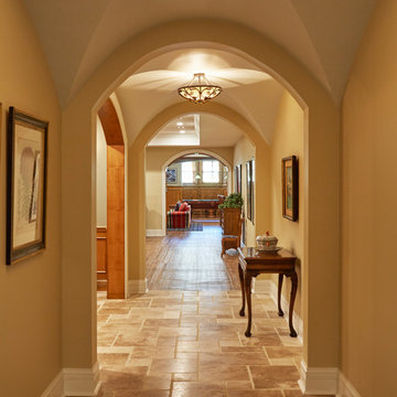 Groin Vault Ceiling with Travertine Flooring in Lower Level