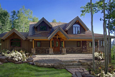 Large rustic gray two-story mixed siding gable roof idea in Orange County