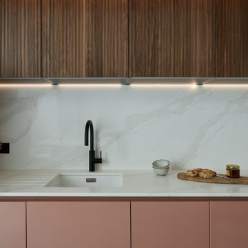 Tuscan rose and gold quartz kitchen