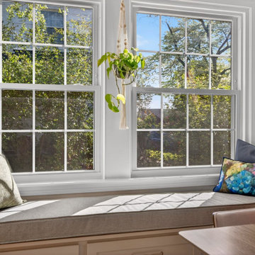 Contemporary Kitchen & Dining Space with Timeless Wood Details