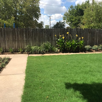 Re-Landscaping Front of Building with Irrigation, New Flowerbeds, Boulder, & Sod