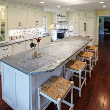 White Cabinets, Grey Countertops and Edgy Tile Backsplash