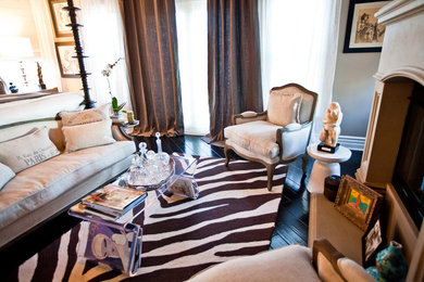 Master dark wood floor bedroom photo in San Diego with beige walls, a standard fireplace and a stone fireplace