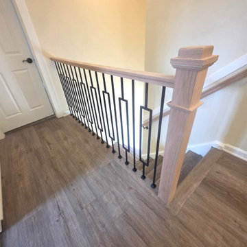 Indoor Railing Installation with Red Oak T-Rail, Box Newels & Black Window Balus