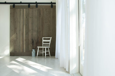 Farmhouse home design photo in Vancouver