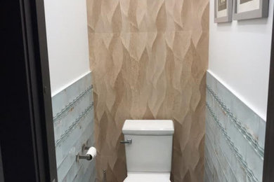 Powder room - transitional powder room idea in New York