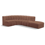 Meridian Furniture - Arc Vegan Leather Upholstered 5-Pc. L-Shaped Modular Sectional, Cognac - Unleash modern opulence with the Arc Vegan Leather 5pc. Sectional. Crafted for the modern connoisseur, this Sectional injects an air of refined luxury into any space. Its sleek silhouette, upholstered in supple cognac vegan leather, exudes timeless sophistication while the deep channel tufting adds textural intrigue, further elevating the chair's visual appeal. The modular design makes it a versatile chameleon, effortlessly adapting to your evolving needs and preferences. Whether you envision it gracing a chic living room corner, basking in the glow of a bedroom window, or adding a touch of drama to a home office, the Arc seamlessly complements your unique interior aesthetic.