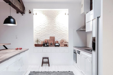 Idée de décoration pour une grande cuisine design.