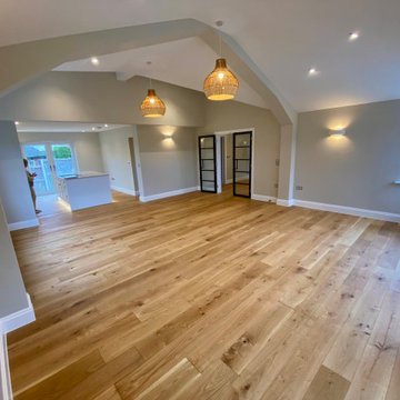Open plan living room looking towards kitchen