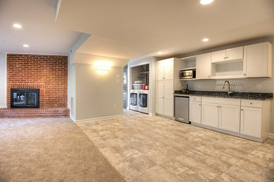 This is an example of a transitional laundry room in Richmond.
