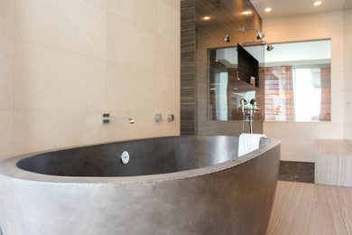 Inspiration for a large modern master porcelain tile and beige floor bathroom remodel in Los Angeles with beige walls