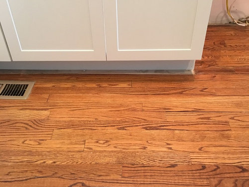 New Cabinets Left Gap On Floor, How To Lay Laminate Flooring Around Kitchen Cabinets