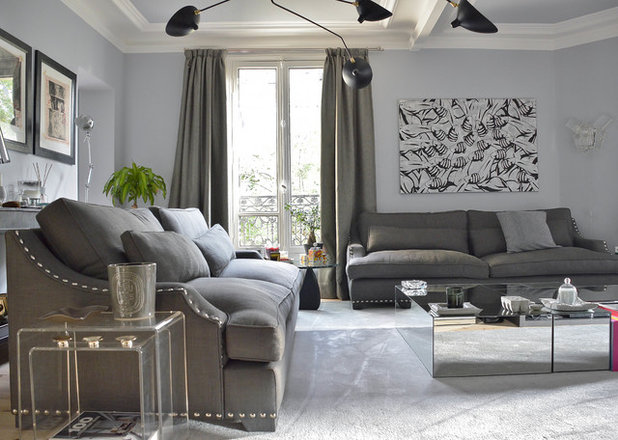 Transitional Family Room by Aline Erbeia