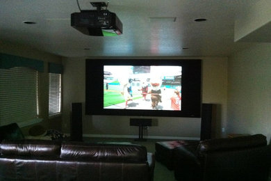 Photo of a traditional home theatre in Denver.