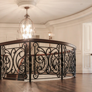 Project #74 | Circular Staircase with Hand-Forged Metal Panels