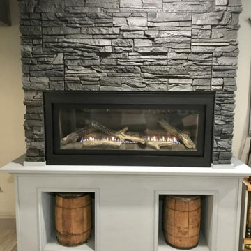 Modern Fireplace Design Ideas Using Iron Ore Stacked Stone