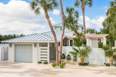 Photo of a beach style home design in Tampa.