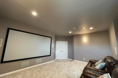 Inspiration for a timeless home theater remodel in Austin