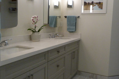 Inspiration for a mid-sized contemporary master ceramic tile, gray floor and double-sink shower bench remodel in Vancouver with shaker cabinets, gray cabinets, beige walls, an undermount sink, quartz countertops, white countertops and a built-in vanity