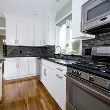 Darker back splash and darker countertops