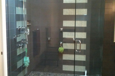 Large minimalist corner shower photo in Tampa with a hinged shower door