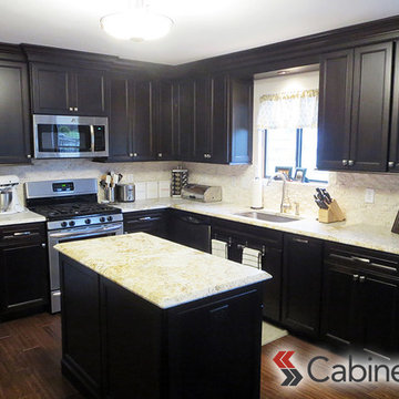 Beautiful Kitchen Featuring Dark Maple Cabinetry on Perimeter and Island