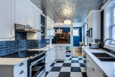 Example of a minimalist kitchen design in Other