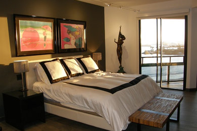 Inspiration for a modern master porcelain tile bedroom remodel in Orange County with gray walls