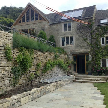 Glass wood balcony and extension, refurbishment of Cotswold stone house