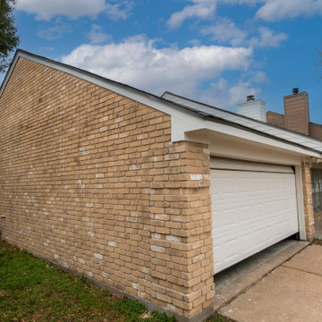 Brick Home Refresh with Hardie Siding, Fascia, Soffit, and Modern Column Replace