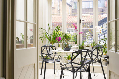 Design ideas for a traditional dining room in London.