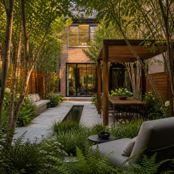 Layered Urban Courtyard Concept for a Narrow Townhouse Backyard