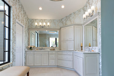 Double shower - large traditional master beige tile and porcelain tile porcelain tile double shower idea in Miami with raised-panel cabinets, marble countertops, multicolored walls, an undermount sink and gray cabinets