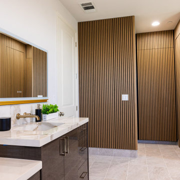 Elegant master bathroom with large format tile