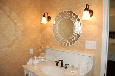 Inspiration for a timeless powder room remodel in Houston