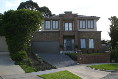 This is an example of a large two-storey brick house exterior in Melbourne.