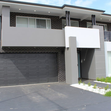 New home with outbuilding